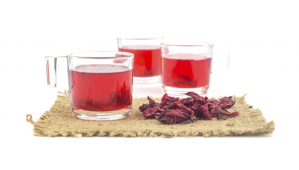 Fresh roselle juice - healthy beverage on white background